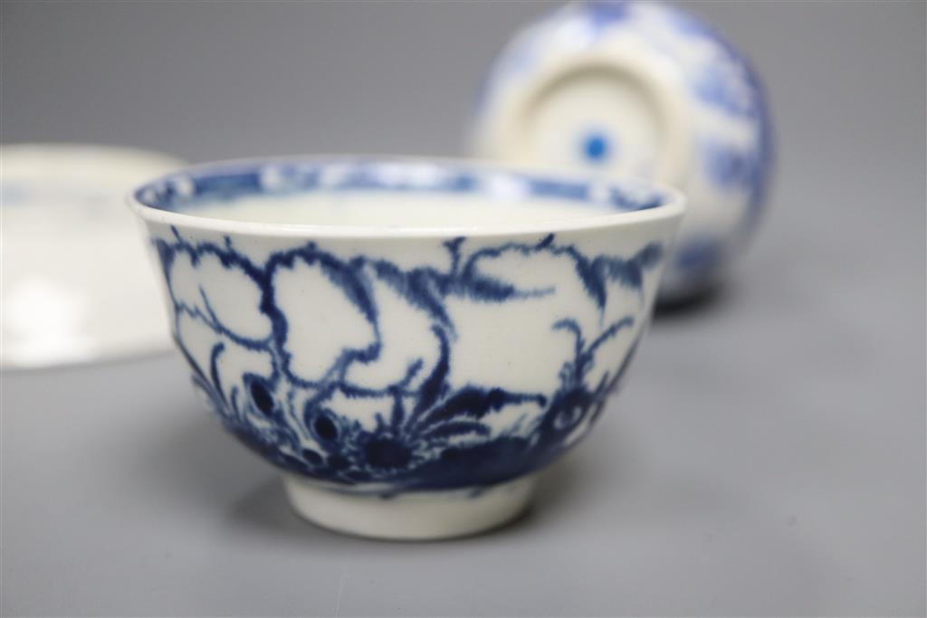 A Worcester Candle Fence tea bowl & saucer, c.1765 and a The Bat sparrow beak milk jug, c.1785,